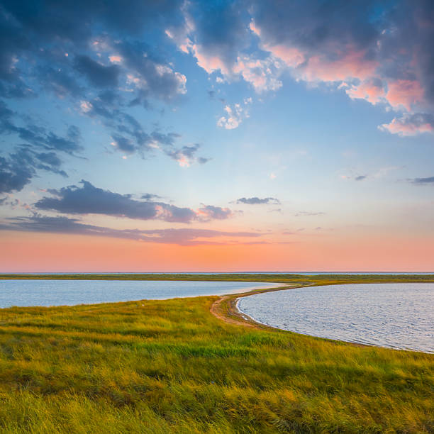 istock small lake among green prairie at the twilight 2221111224