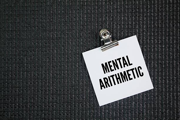 istock White paper with the word mental arithmetic. arithmetical calculations performed in the mind, without writing figures down or using a calculator 2221114995