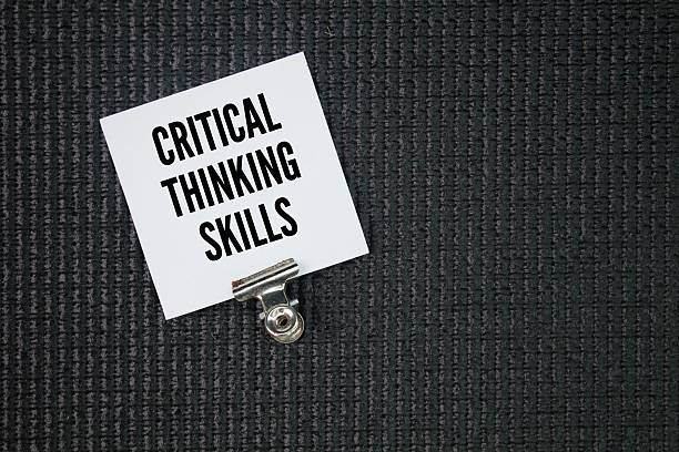 istock White paper with the words critical thinking skills. the ability to objectively analyze information, evaluate evidence, identify biases, and form reasoned judgments. 2221116561