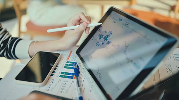 istock hand of gen z female using digital pen on touch screen for data visualization and ai-powered interface work 2221117965