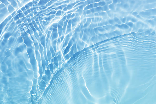 istock abstract blue color water wave. natural swirl pattern texture. background photography. 2221118146
