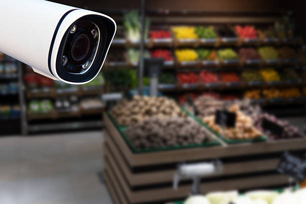 istock CCTV camera system security in shopping mall supermarket blur background 2221120978