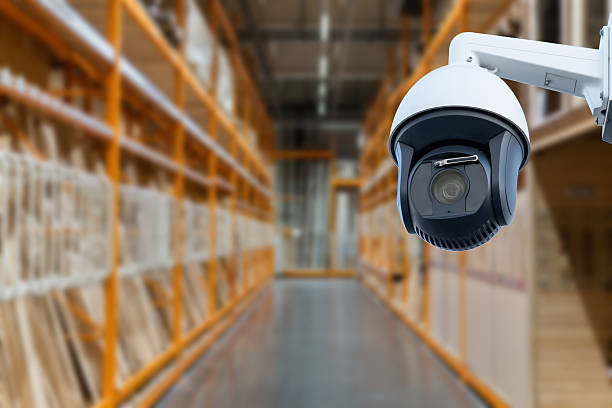 istock CCTV Camera or surveillance operating inside industrial factory. 2221121014