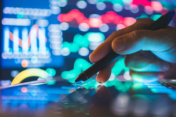 istock Financial advisor using digital finance interface to analyze real-time stock performance metrics with data-rich financial dashboard for trading activity 2221121427