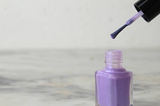 istock Checking gel nail polish for fluidity. High-quality and poor materials for manicures, pedicures, copyspace 2221124596