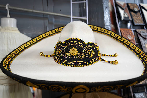Traditional Mexican charro hat with gold embroidery on display in a local market in Guadalajara, Jalisco, Mexico, symbolizing Mexican heritage and craftsmanship