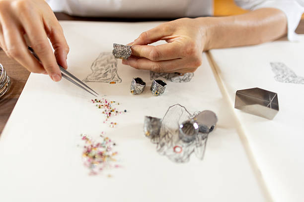 istock Woman making jewelry in her studio 2221125244
