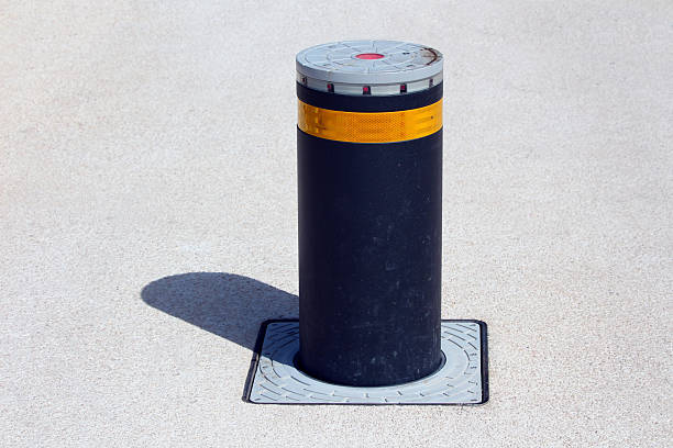 istock Retractable traffic bollard with yellow reflective band 2221129217