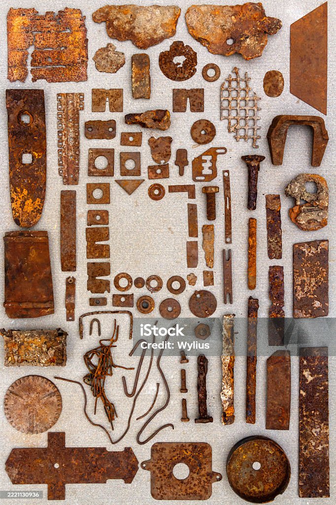 Rust Bits A Group Of Various Old Rusty Bits And Pieces Arranged On A Concrete ...