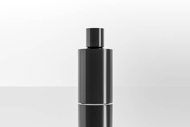 istock black cosmetic plastic bottle with disk top flip cap mockup, flat disk cap round shampoo packaging, cylinderical shape squeeze bottle, short cylinder shape bottle, small modern skincare container 2221135153