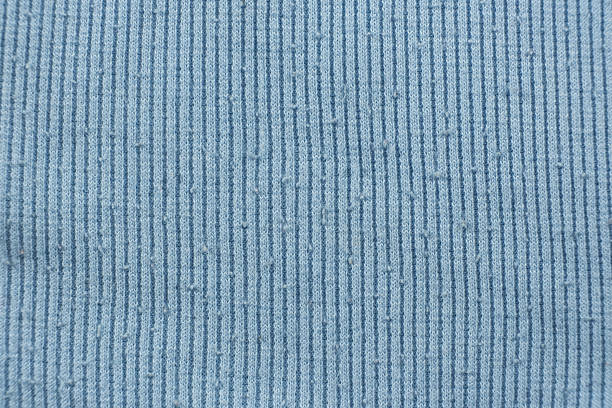istock Low-quality cotton elastane fabric, lots of pilling on the surface. 2221135577