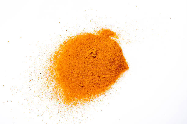 istock Turmeric with its magnificent orange color on a white background 2221136983