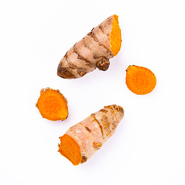 istock Turmeric with its magnificent orange color on a white background 2221137024