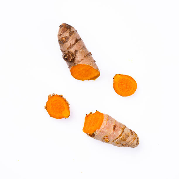 istock Turmeric with its magnificent orange color on a white background 2221137083