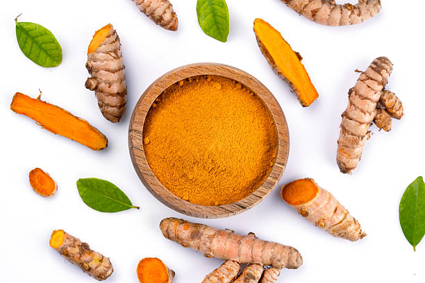 istock Turmeric with its magnificent orange color on a white background 2221137807