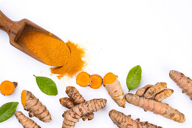 istock Turmeric with its magnificent orange color on a white background 2221137875