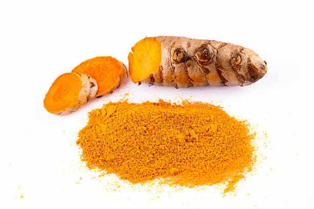 istock Turmeric with its magnificent orange color on a white background 2221137941