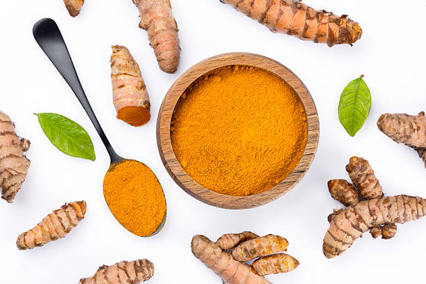 istock Turmeric with its magnificent orange color on a white background 2221137960