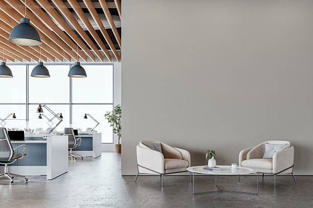 istock Modern Office Interior with light gray wall and Minimalist Lounge Area on microcement floor 2221138253