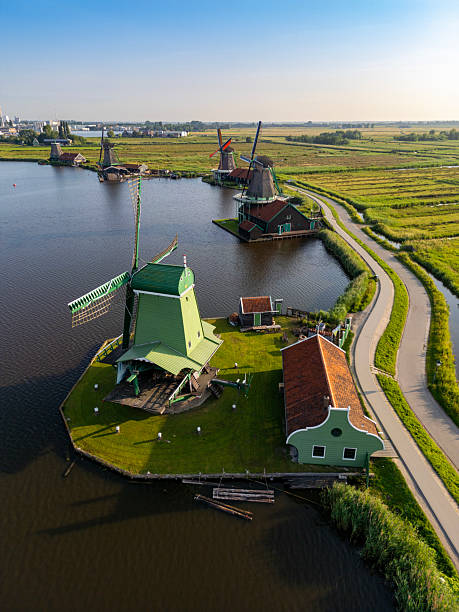 istock Windmills at Zaanse Schans in Holland at sunrise. 2221138375