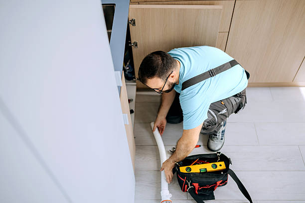 istock Plumber fixing kitchen sink in apartment 2221138748