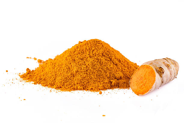 istock Turmeric with its magnificent orange color on a white background 2221142392