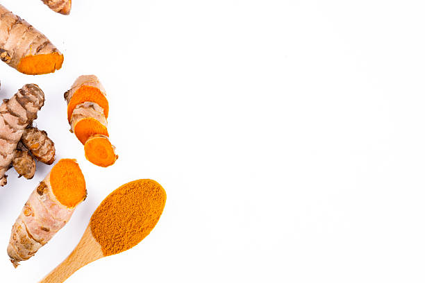 istock Turmeric with its magnificent orange color on a white background 2221142454