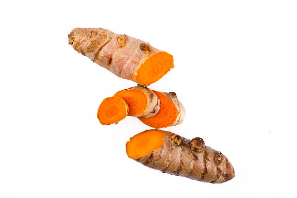 istock Turmeric with its magnificent orange color on a white background 2221142472