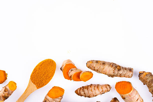 istock Turmeric with its magnificent orange color on a white background 2221142499