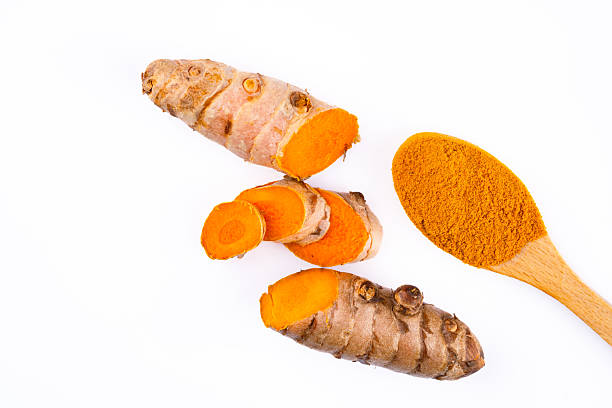istock Turmeric with its magnificent orange color on a white background 2221142529