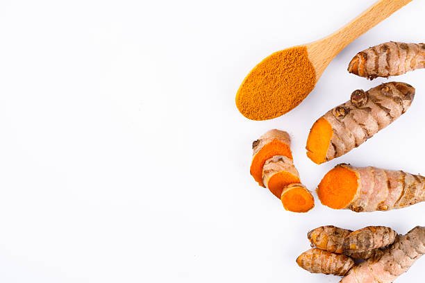 istock Turmeric with its magnificent orange color on a white background 2221142532