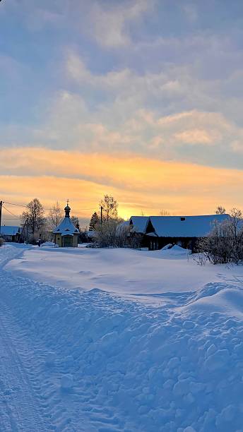 istock Winter village at sunset 2221145504