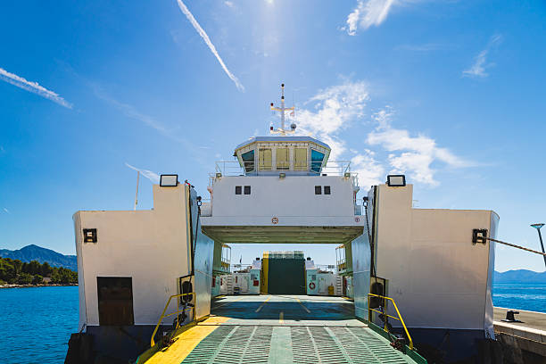 istock Coastal Transport Vessel with Ramp Down 2221147178