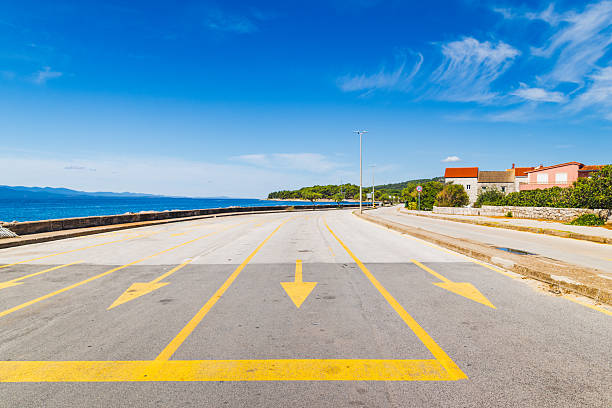 istock Sunny Summer Road to Ferry Dock – No Vehicles 2221147329