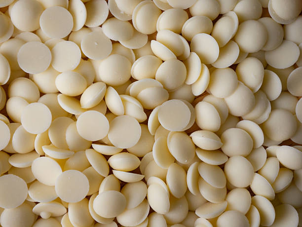 istock White chocolate chips Pistols buttons. Confection and pastry concept. 2221147626