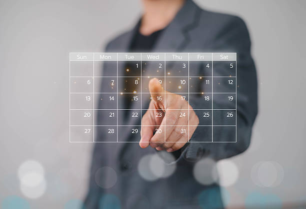 istock Business people use work schedules in business as a technological plan and project for proper planning and knowing the timeline of the work progress. 2221147805