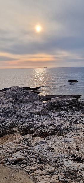 istock rocks on the ocean Istria 2221152118
