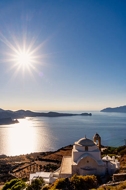 amazing view of Greek churches on Milos island, whitewashed architecture, traditional orthodox culture, seascape, top on hill