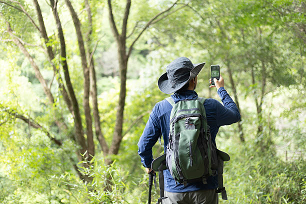 istock Man hiking in forest park 2221158980