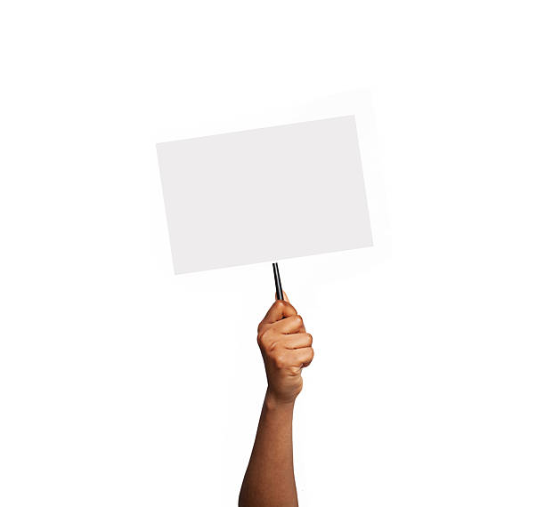 istock Hand Holding a Blank Sign Paper Board Isolated on White Background 2221163658