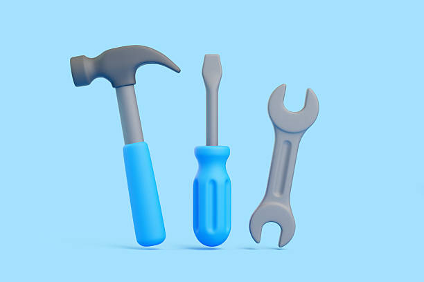 istock 3D Cartoon Hammer, Screwdriver, and Wrench on Blue Background 2221166196