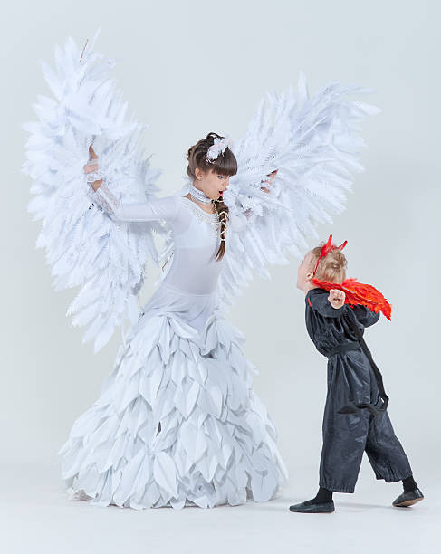 Beautiful woman dancing ballet with animal wings