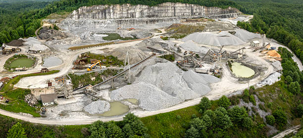 istock Sand open-pit mining quarry with processing plant for crushed stone. Extracting of natural resources for construction industry 2221170990