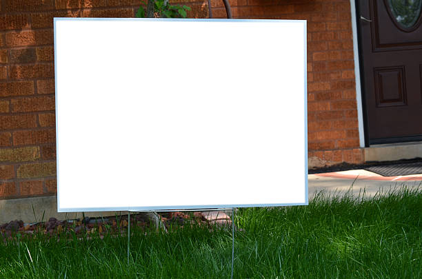 istock A blank banner sign on yard 2221179580