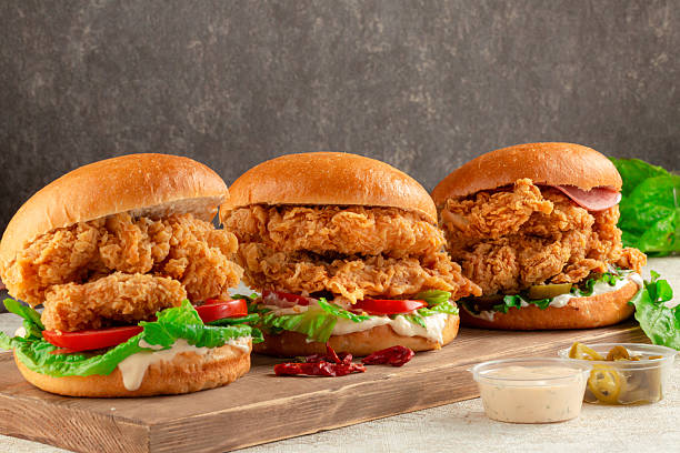 istock Chicken burger assortment with salami barbecue sauce and lettuce. 2221180795