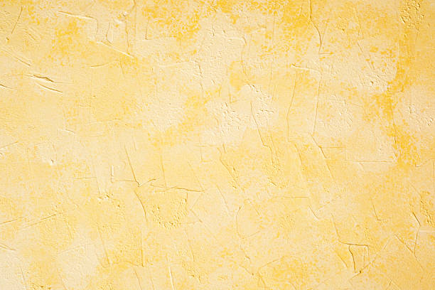 istock Yellow stucco wall with soft plaster texture and pastel surface 2221182483