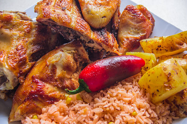 istock An appealing dish highlighting grilled chicken served alongside seasoned rice and fresh potatoes, appealing to food lovers and those who appreciate culinary art. 2221188554
