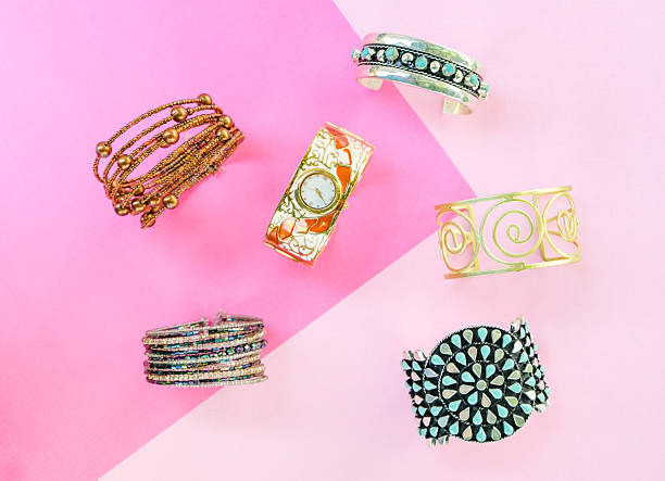 Costume Jewelry Bangles On Colored Paper