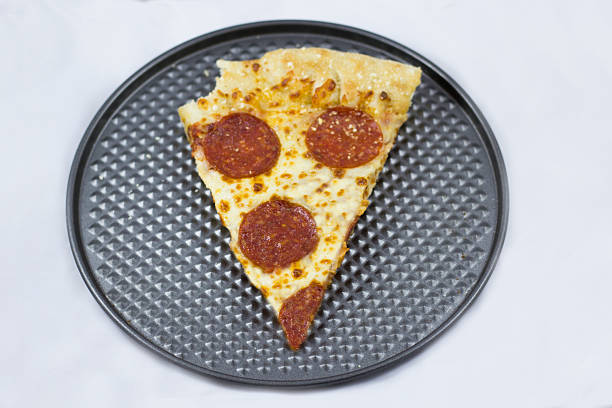 A delicious pepperoni pizza slice showcasing its bubbling cheese and crispy crust, a favorite choice for pizza lovers looking for a quick and satisfying meal.