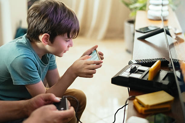 Family playing video games at home